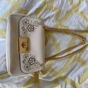 Smaller Coach purse purchased new never used .
